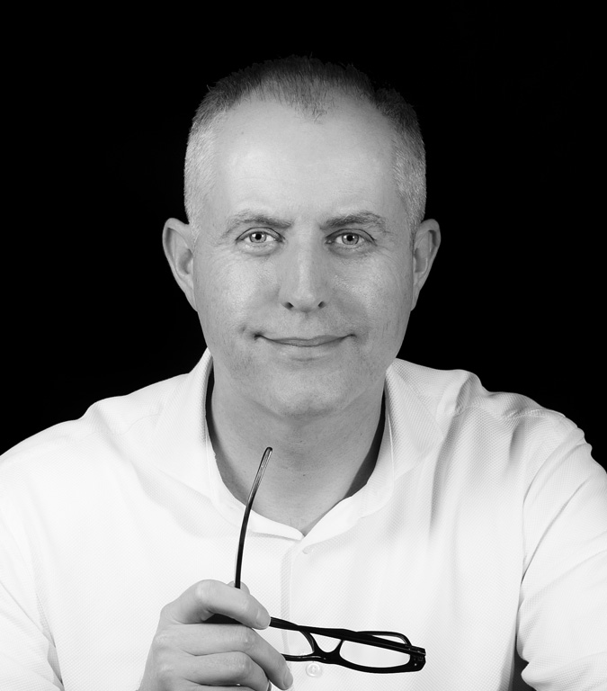 Kieran donaghy close up holding glasses bw web Kieran Donaghy